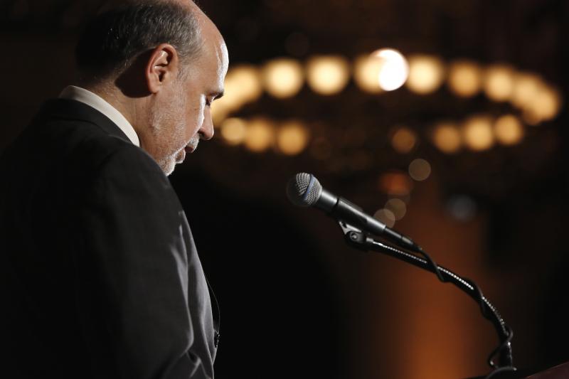 Bernanke addresses the National Economists Club annual dinner at the U.S. Chamber of Commerce in Washington, November 2013. Under Bernanke, the Fed failed to use its supervisory powers to curtail the buildup of financial imbalances.