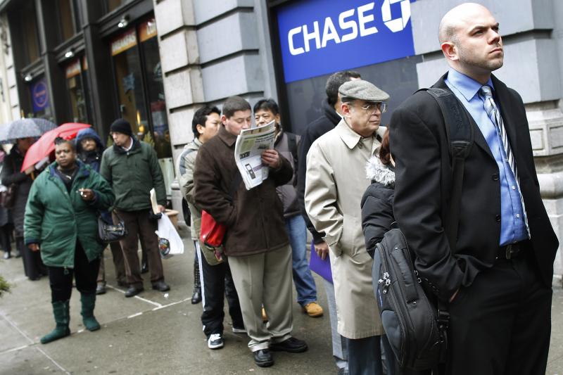 People wait in line to enter the NYCHires Job Fair in New York, February, 2010.