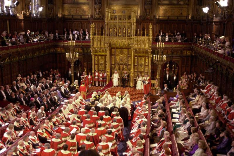 Queen Elizabeth II and the Duke of Edinburgh at the State Opening of Parliament at Westminster Abbey in London, June 2001