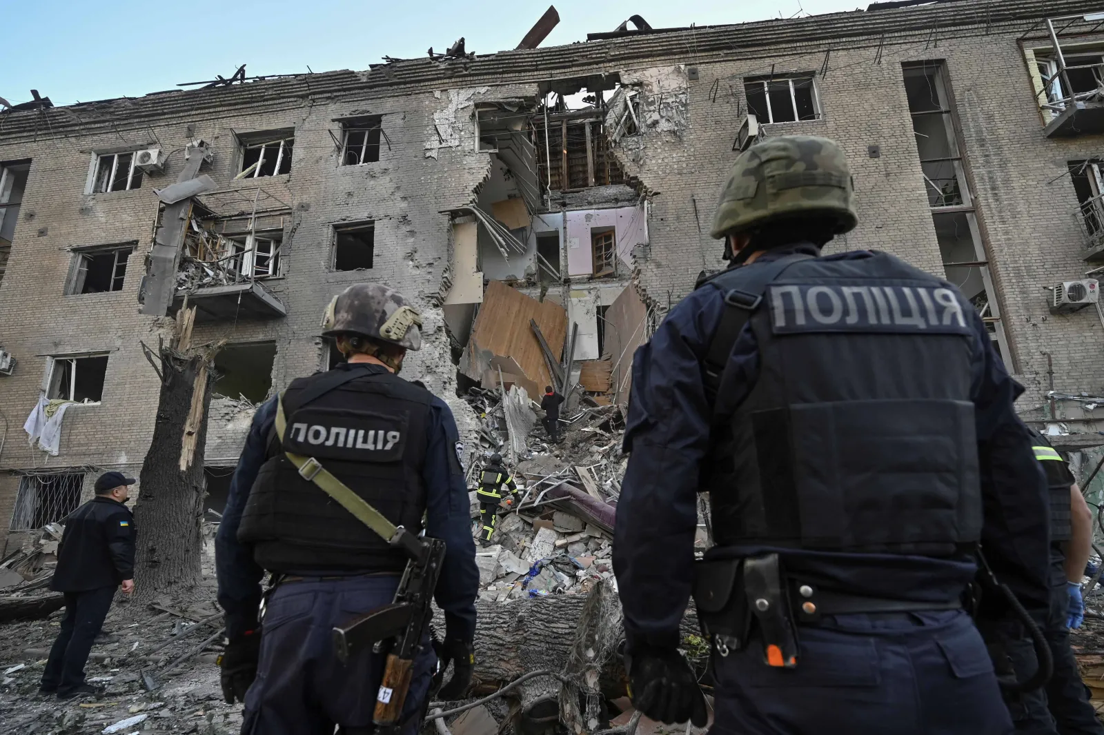 Ukrainian police near a building hit by a Russian airstrike, Zaporizhzhia, Ukraine, September 2024