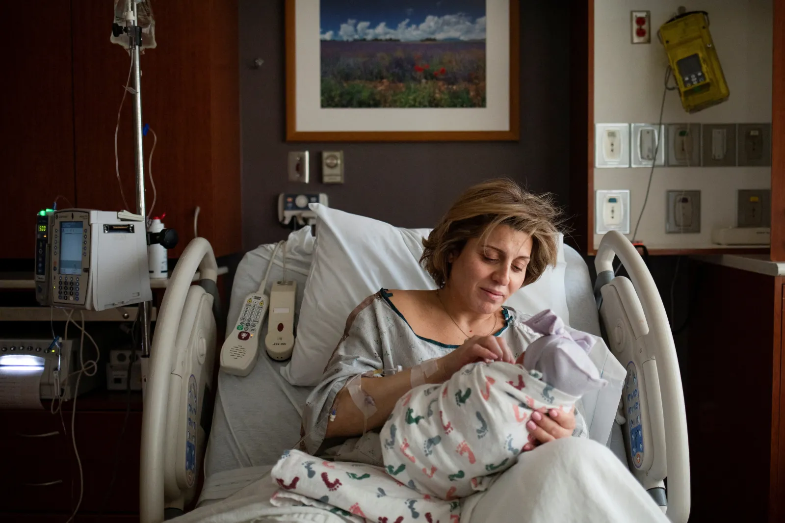 A mother holding her newborn in Royal Oak, Michigan, February 2022